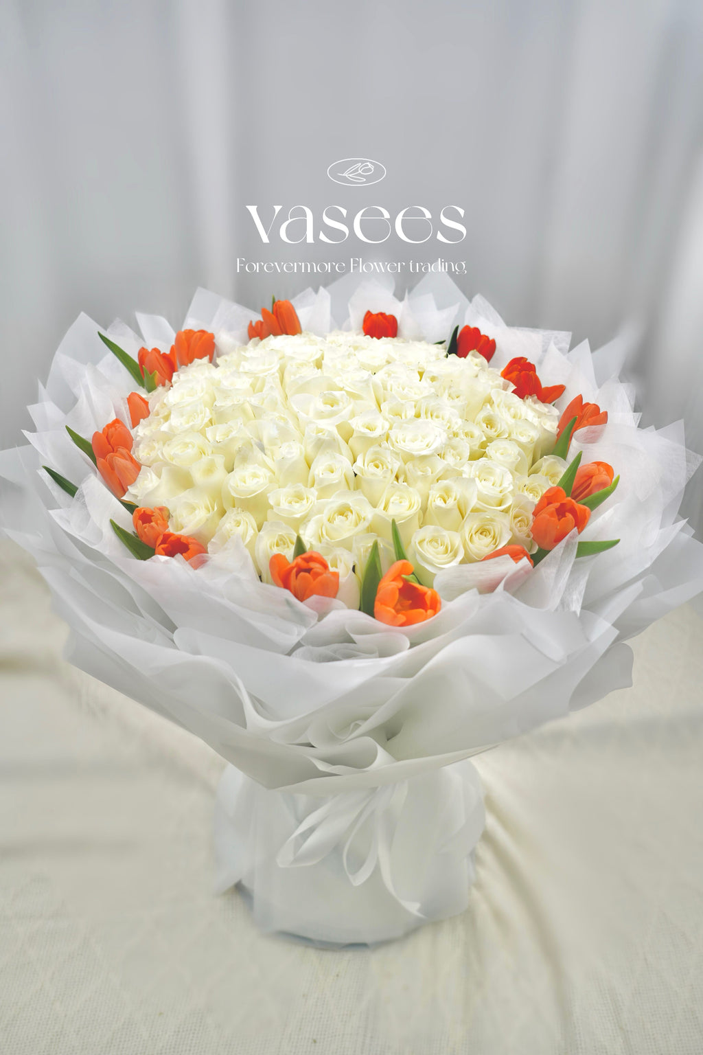 Premium White Roses Served With Tulips