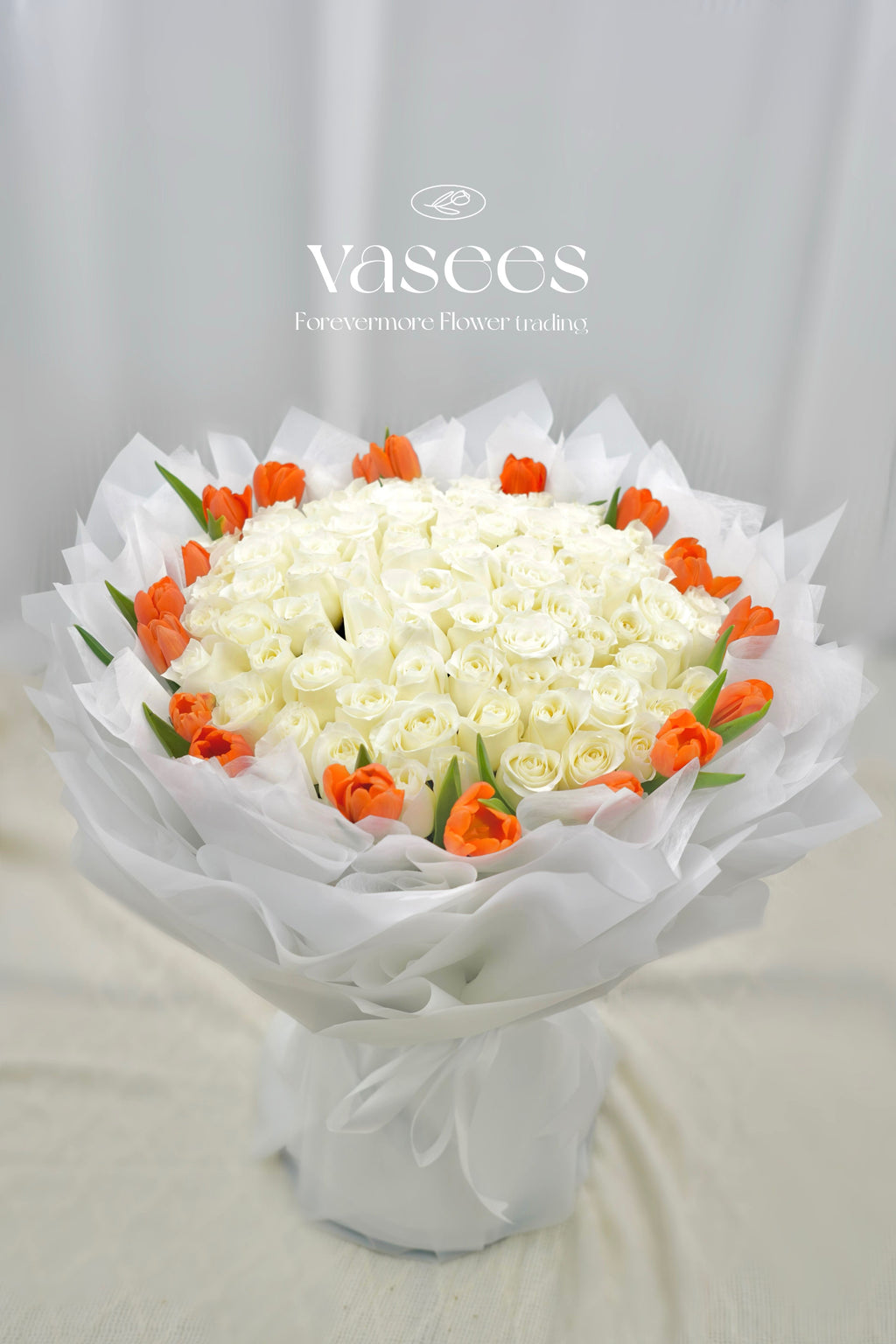 Premium White Roses Served With Tulips