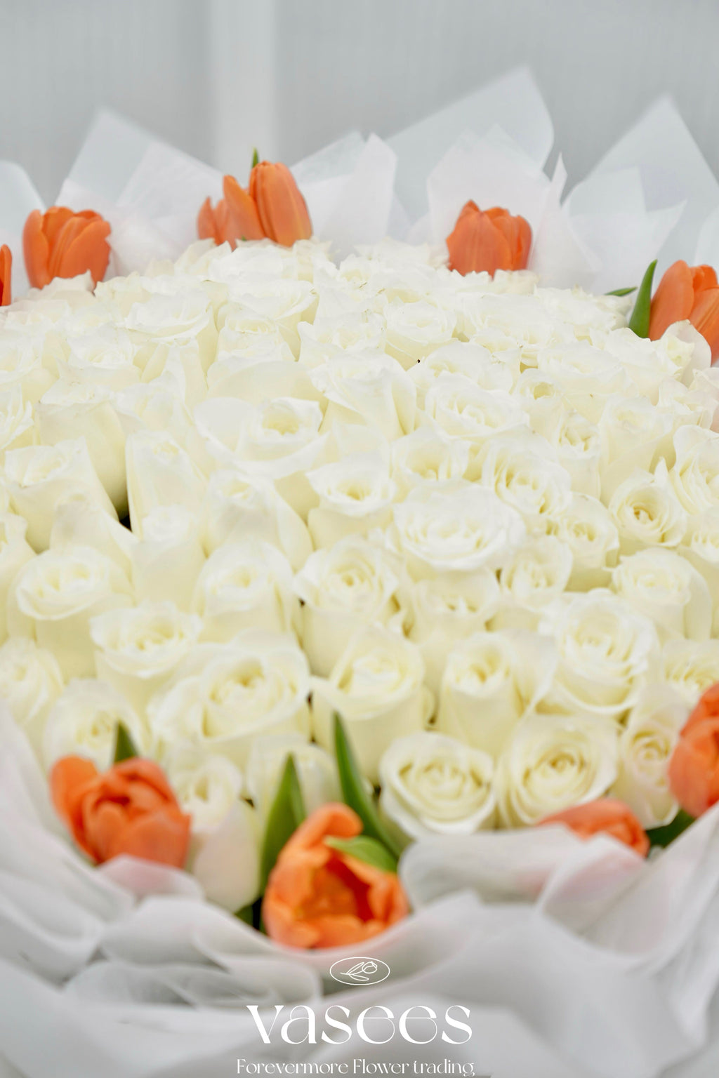 Premium White Roses Served With Tulips